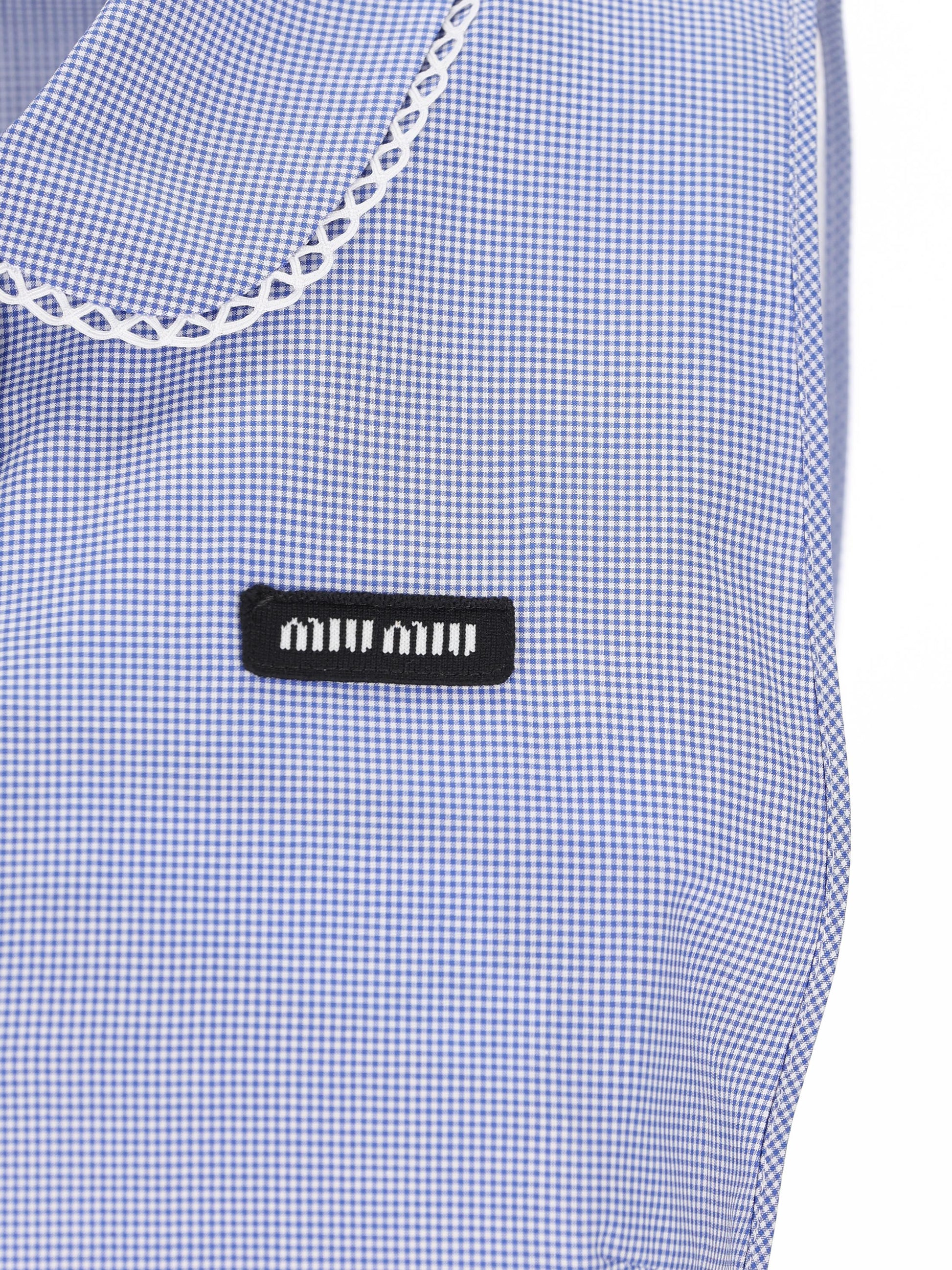 Abito realizzato in cotone. MF6203 187GF0AZ1 MIU MIU 