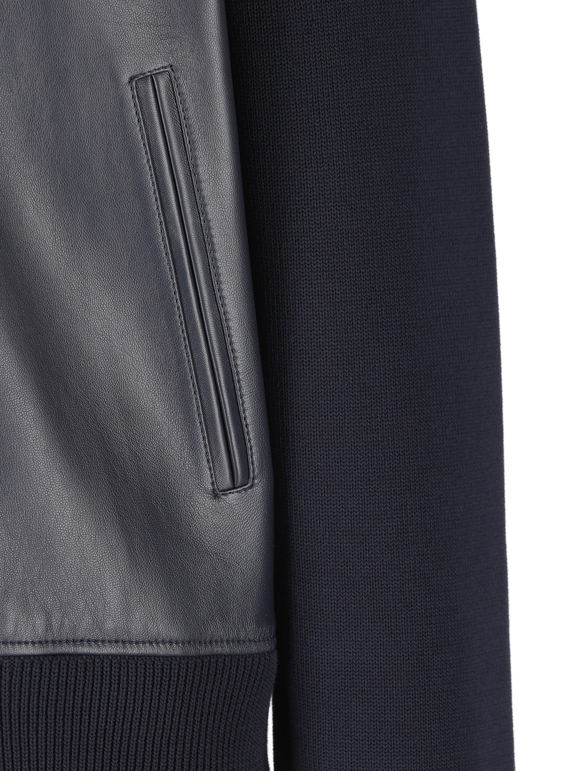 Bomber realizzato in pelle e maglia. 793181 XNA294044 GUCCI 