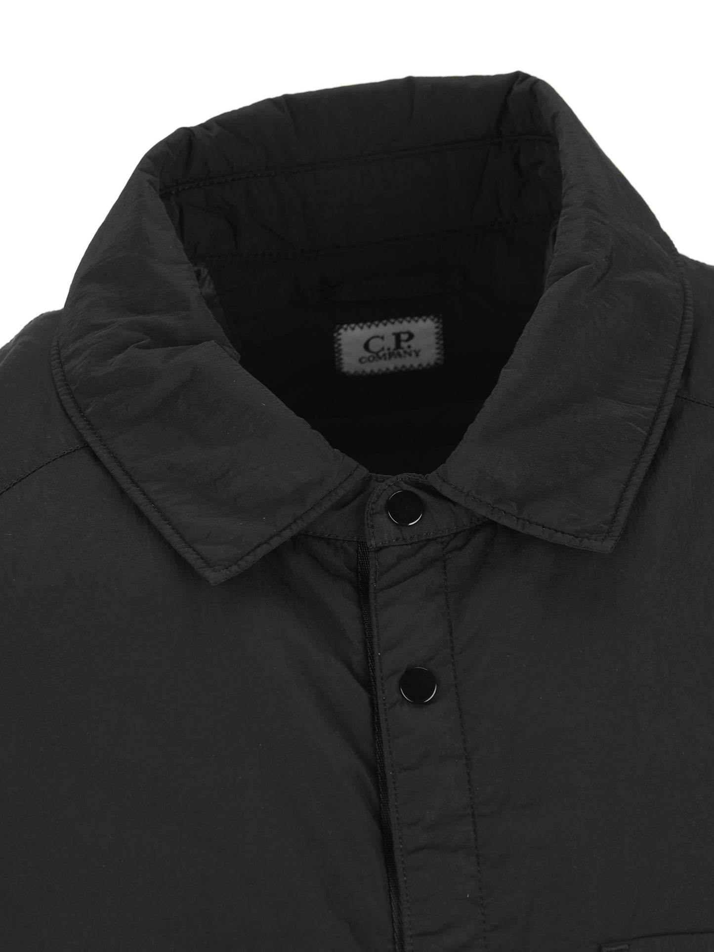 Overshirt realizzata in poliammide. 19CMOS088A 005904G999 C.P COMPANY 