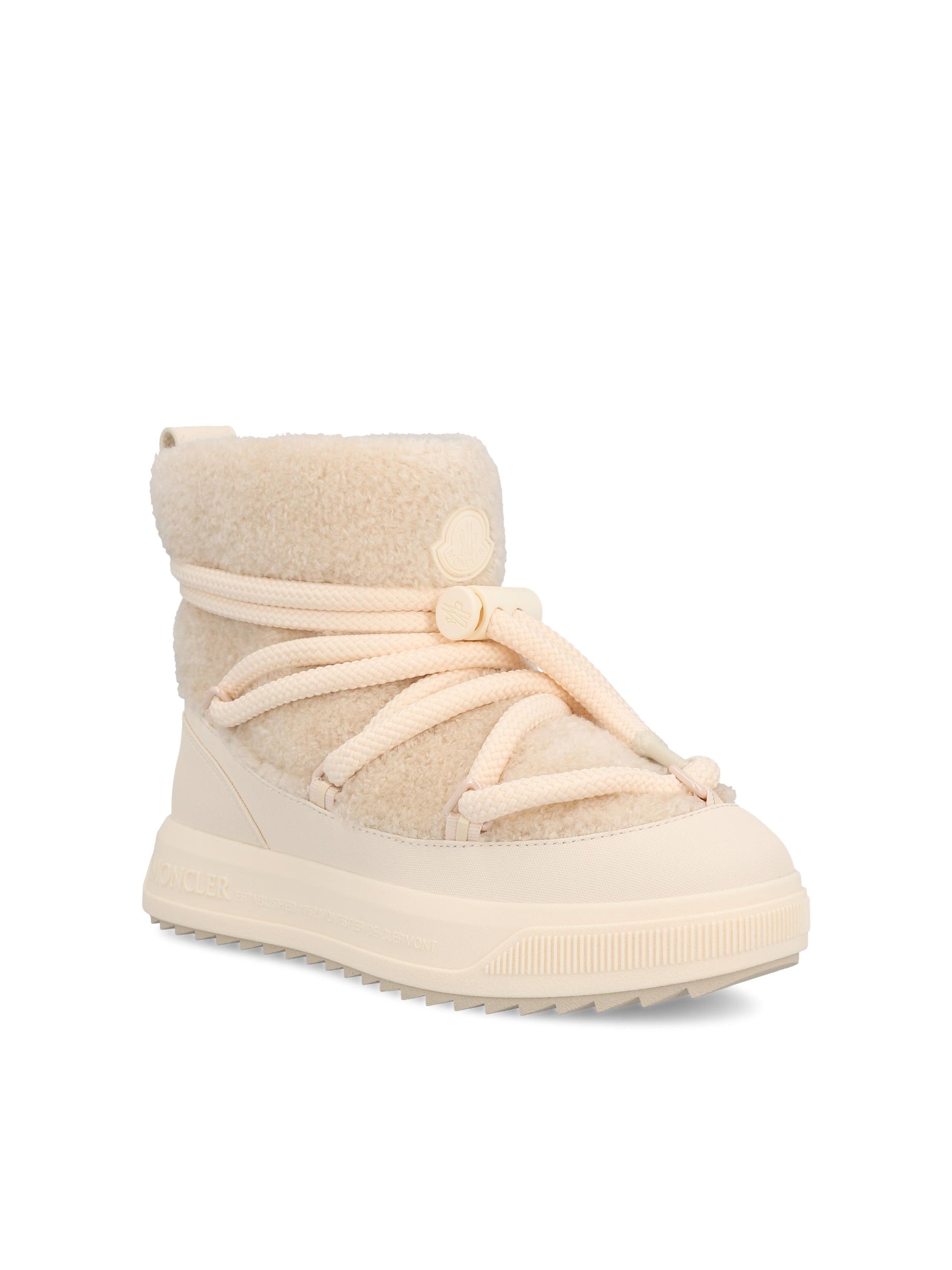 Stivali realizzati in pile effetto teddy e poliuretano. W4H00010 M945721I MONCLER 