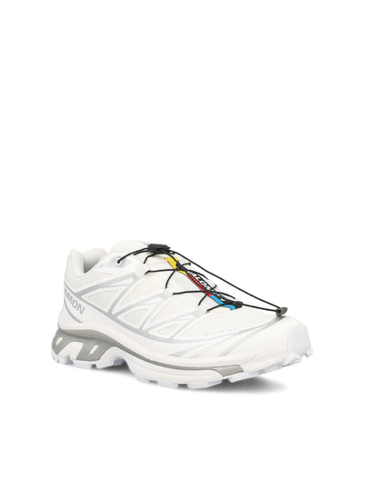 Sneakers realizzate in materiale sintetico. L47581 100 SALOMON 