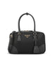 Bauletto realizzato in re-nylon e saffiano. 1BB115 R064F0002 PRADA 