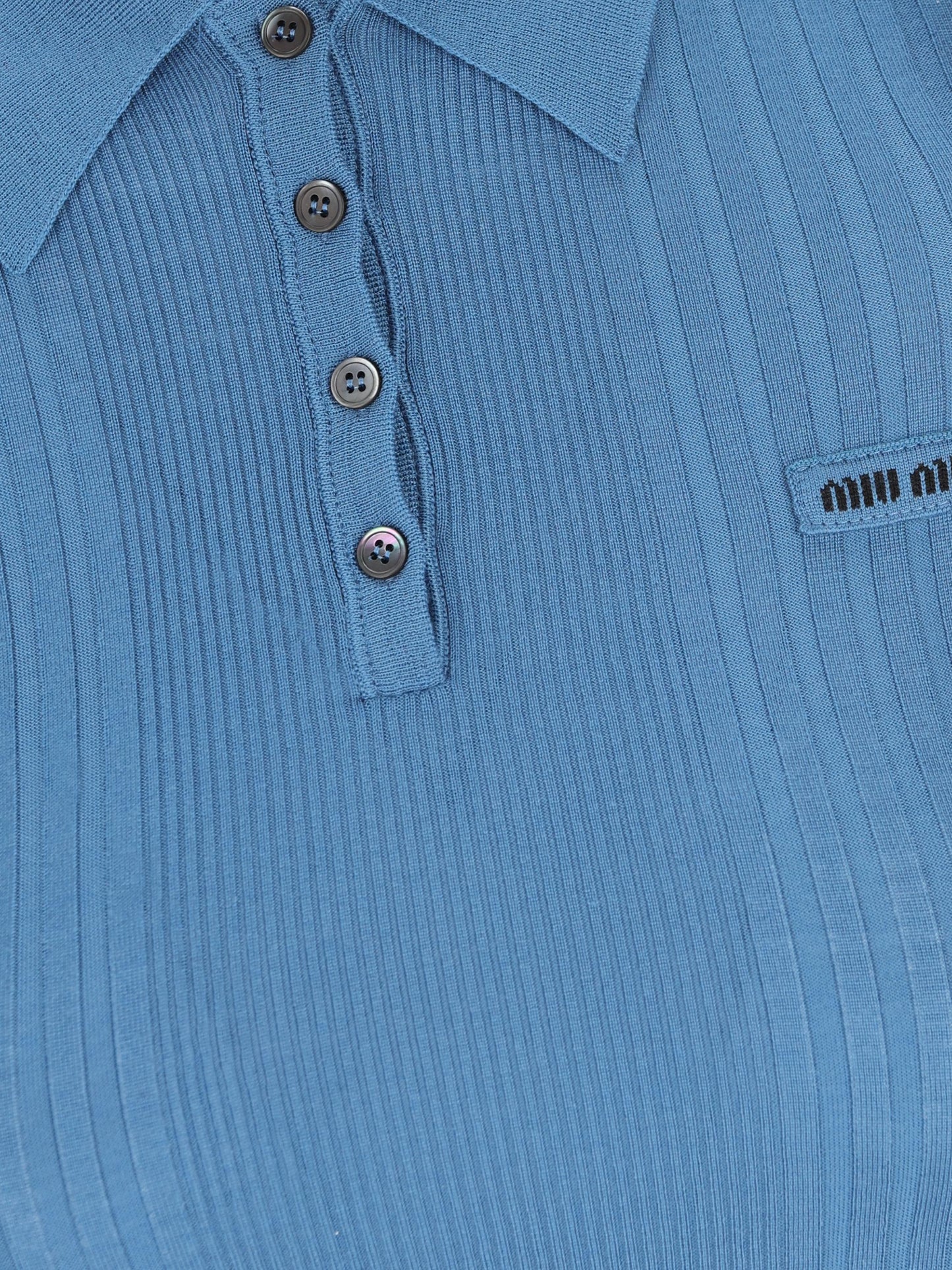 Polo realizzata in lana vergine. MML02B 18TWF0154 MIU MIU 