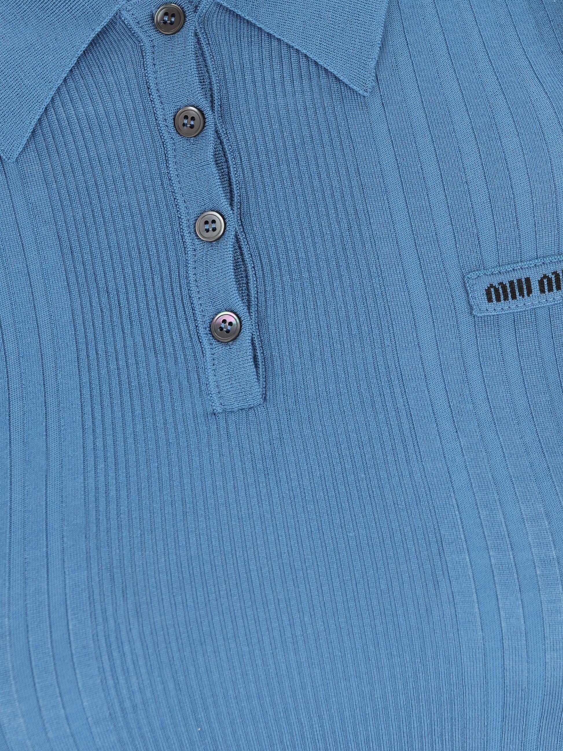 Polo realizzata in lana vergine. MML02B 18TWF0154 MIU MIU 